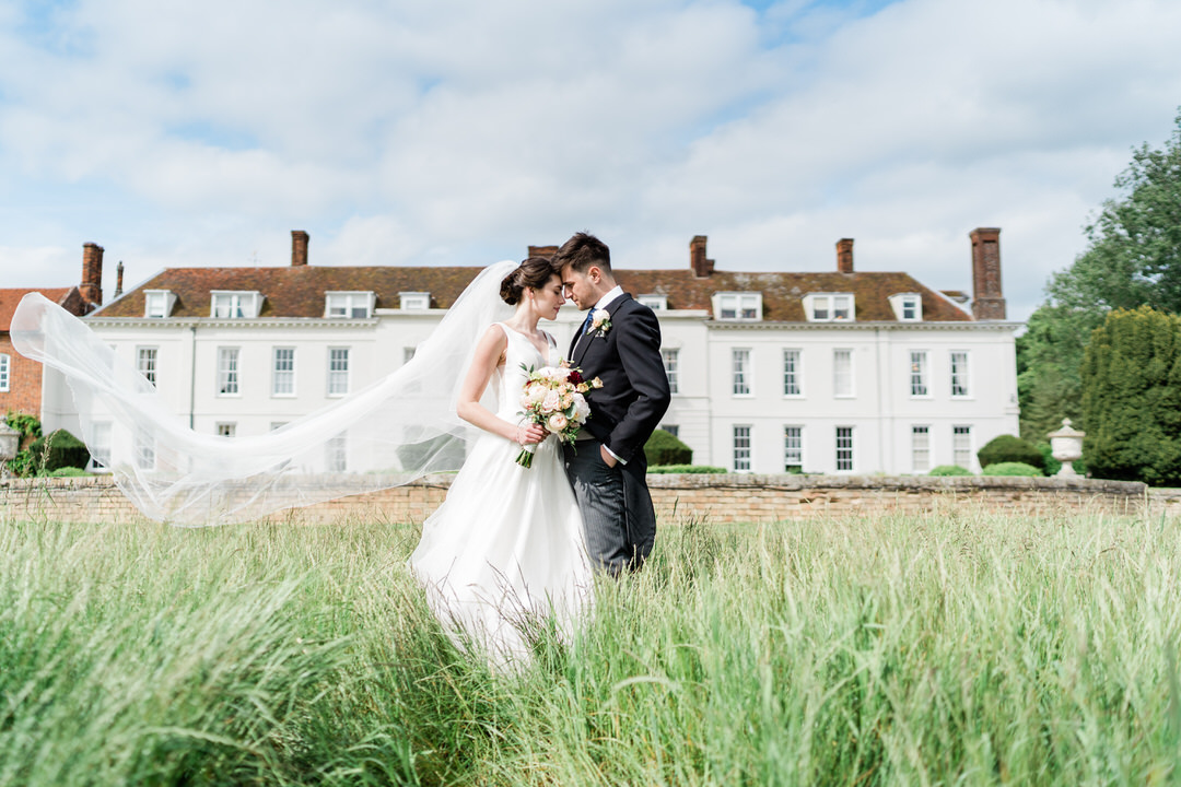 Bride and groom portraits at Gosfield Hall.