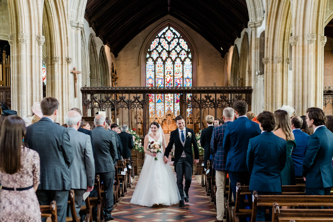 Inside Lavenham church during a wedding ceremony.
