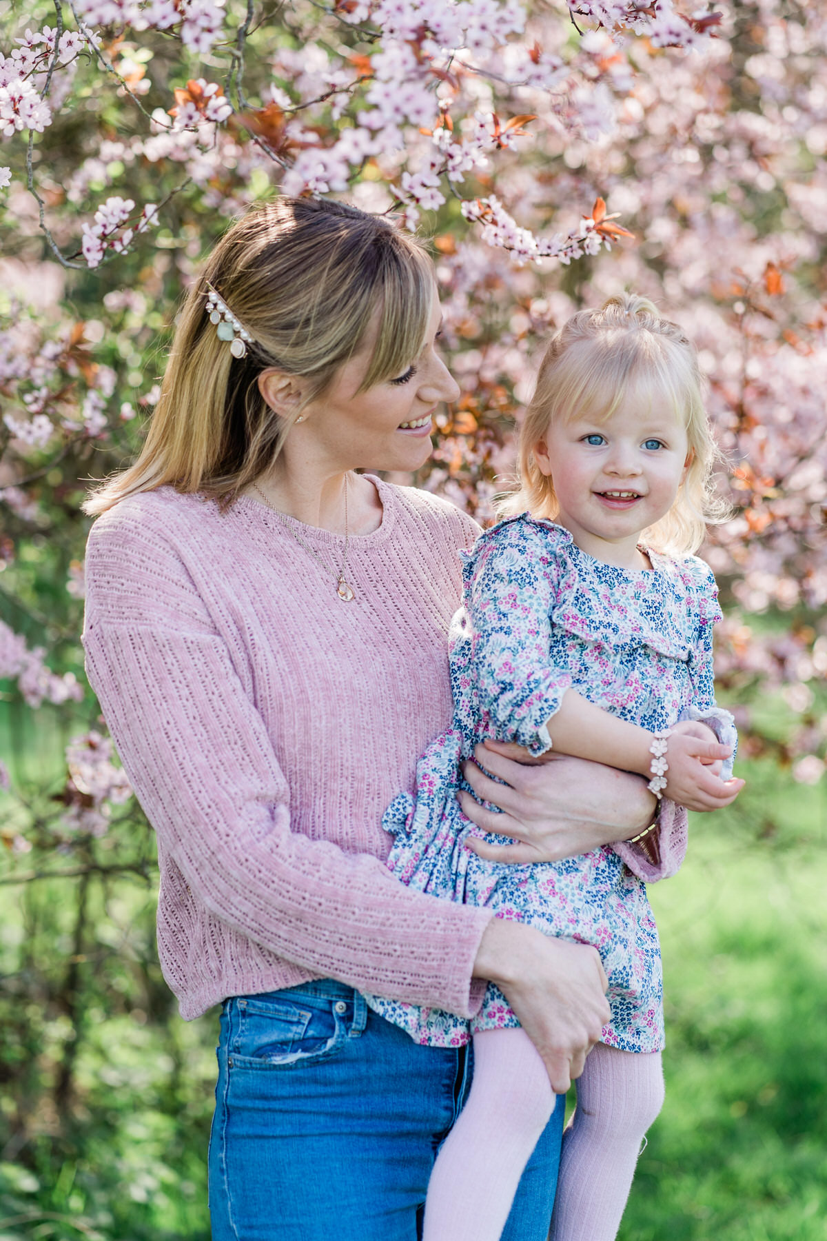 Mother and daughter photo in front of cherry blossom tree in Braintree, Essex.
