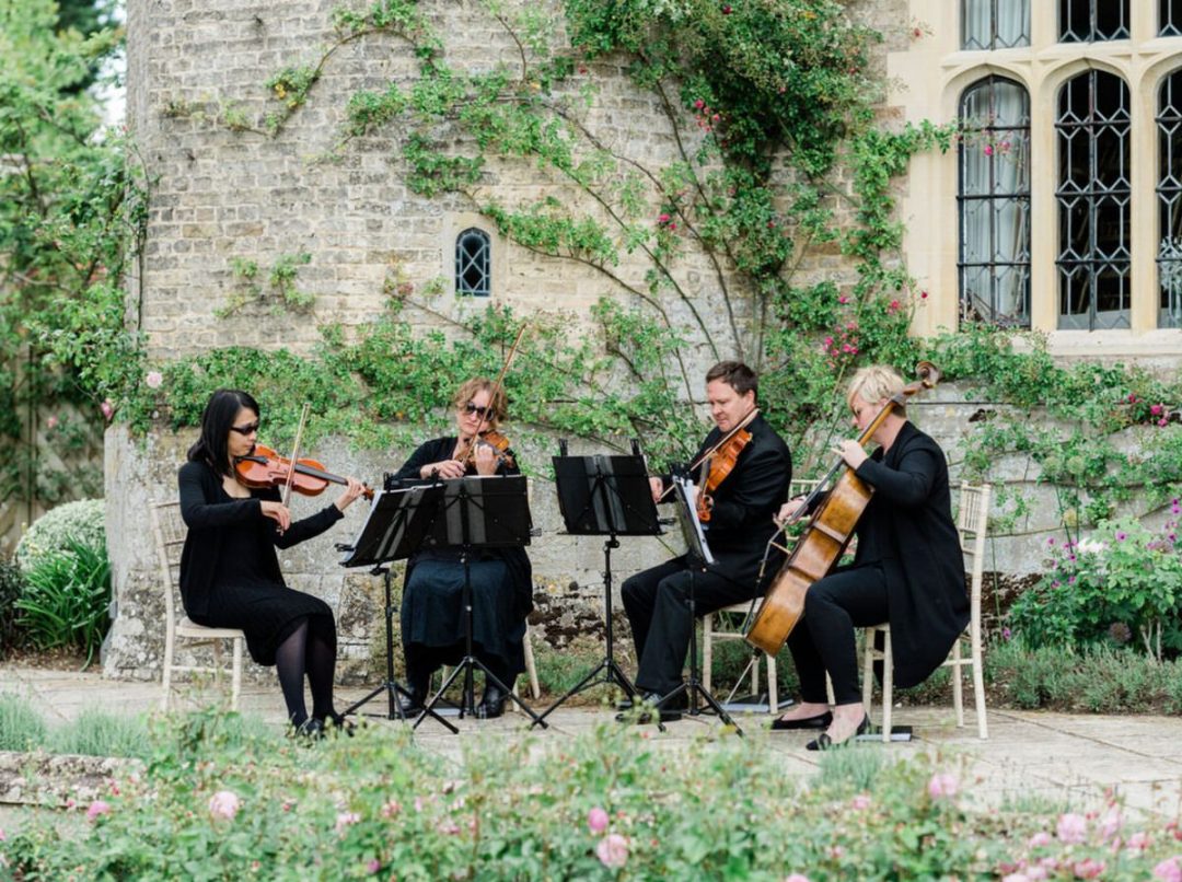 Scintillo String Quartet playing at Hengrave Hall wedding.