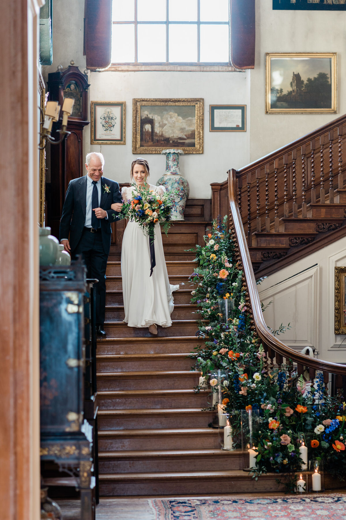 Cara walking down the aisle/stairs at Glemham all but fore the ceremony.