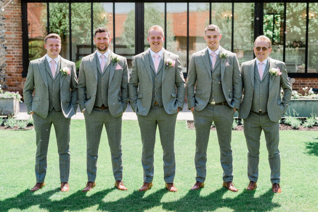 groomsmen in the courtyard at the granary estates