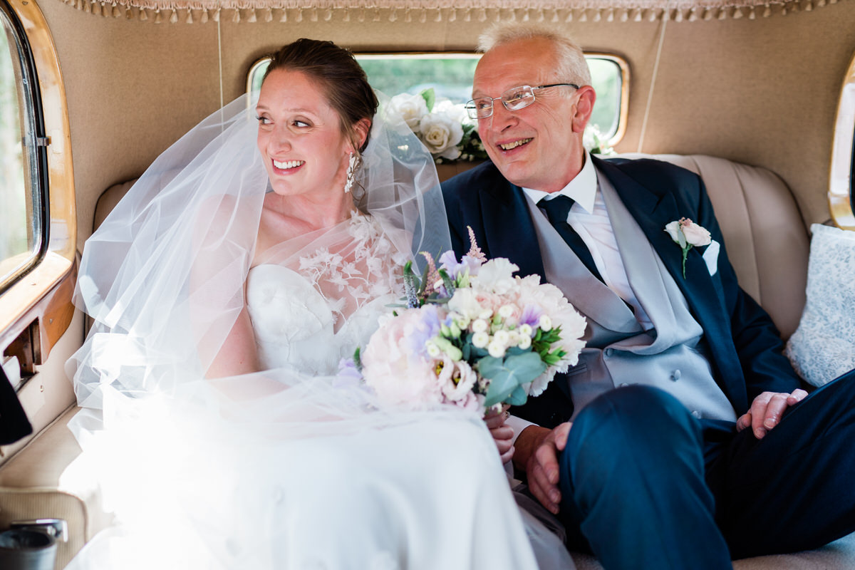father of the bride and bride travelling to Manningtree church